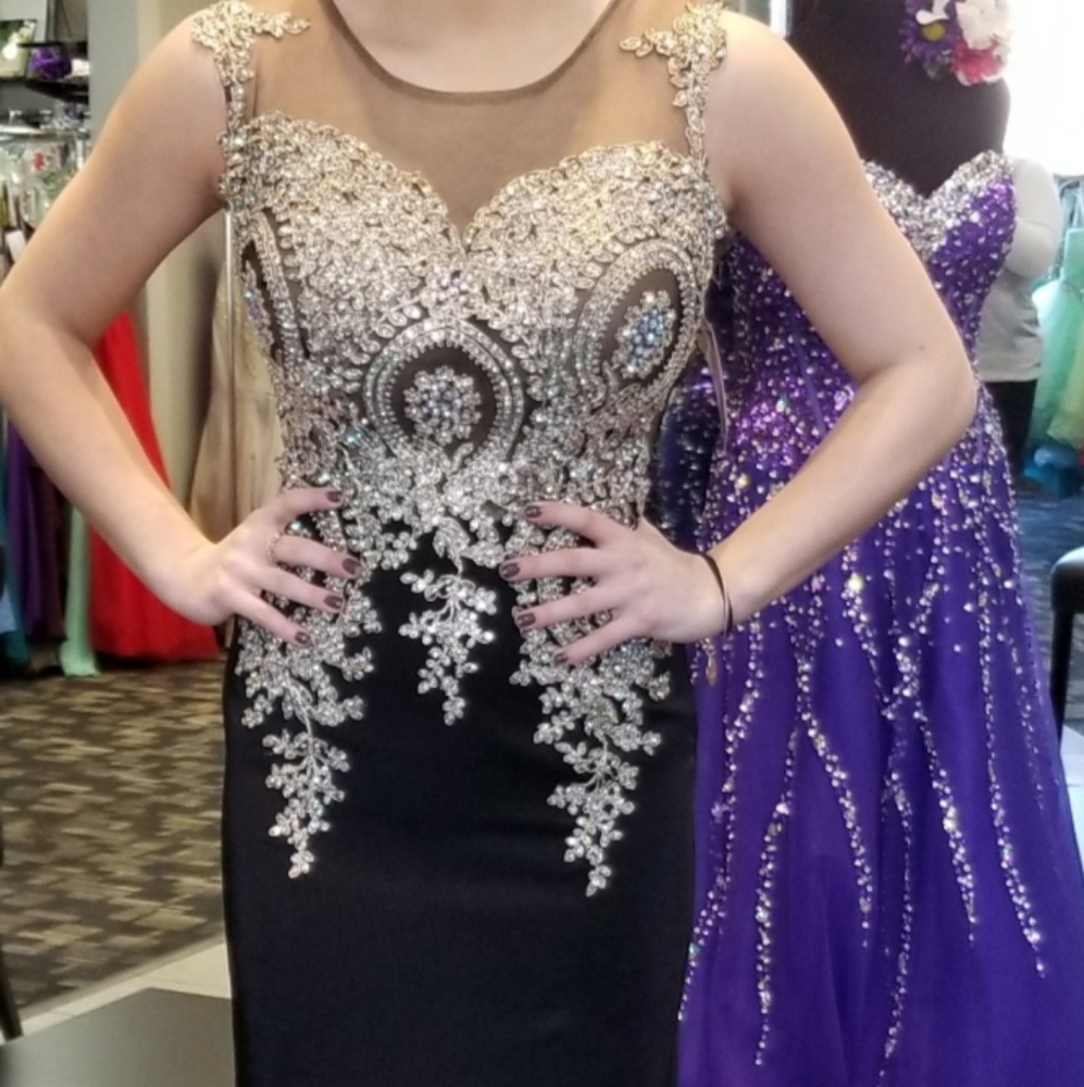 Black and gold applique gown. Size 4.